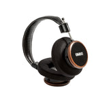 Grado Signature S550 Open-Back Headphones, Brazilian Walnut, angled view resting on a headphone stand