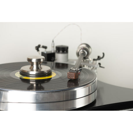 Grado Statement4 cartridge on silver turntable, clean studio shot