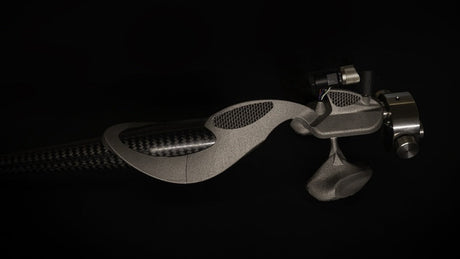 Wilson Benesch Graviton Ti graphene carbon fiber arm tube side profile showing hyperbolic curve geometry and monolithic headshell