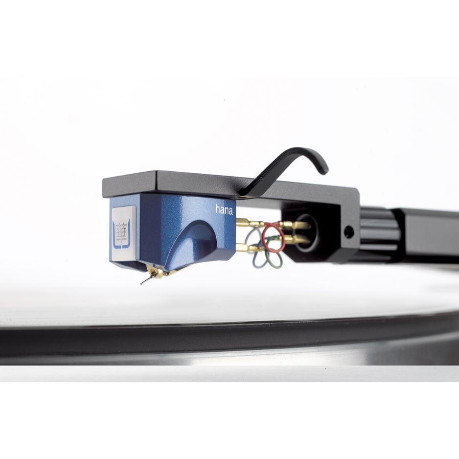 HANA Umami Blue Moving Coil Cartridge (Open Box), mounted on a headshell above a record with the tonearm attached