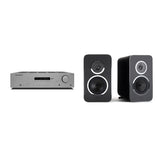 Mike's $1,299 HiFi System: Cambridge Audio AXR100 stereo receiver in grey beside a pair of Rega Kyte bookshelf speakers in black, one facing forward and one angled to show its curved cabinet