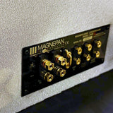 Magnepan DWMx Bass Panel, Off White, rear connection panel close-up showing the gold binding posts, amplifier input and bass attenuation terminals