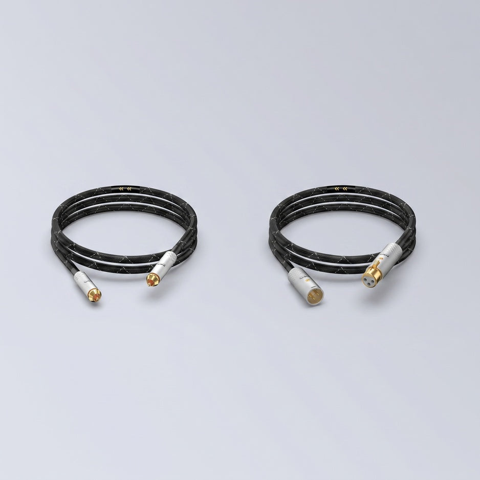 Matrix Audio OCC Hi-Fi Analog Interconnect Cable RCA and XLR coiled three-quarter view on gray gradient