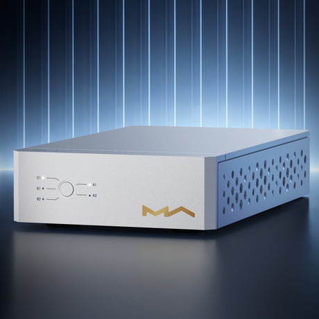 Matrix Audio SU-1 USB Isolation Switcher, Silver, front three-quarter view under blue stage lighting