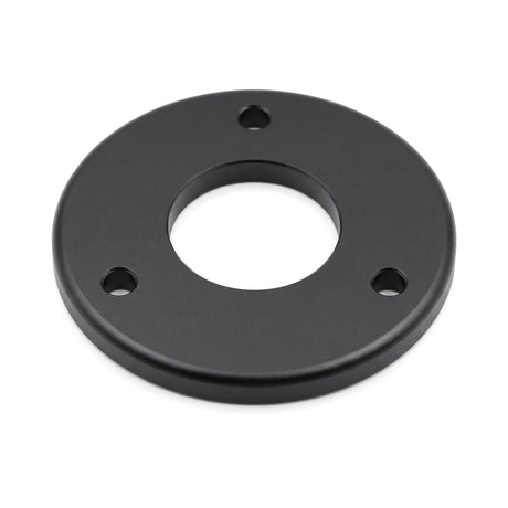 Michell Rega Arm Spacer Turntable Accessory, Black, three-quarter view showing the 3-bolt hole pattern