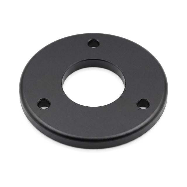 Michell Rega Arm Spacer Turntable Accessory, Black, three-quarter view showing the 3-bolt hole pattern