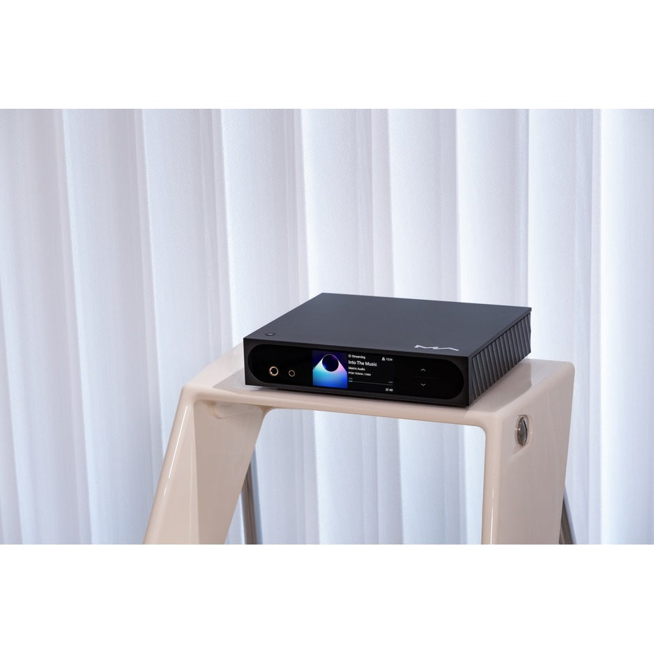 Matrix Audio mini-i Pro 4 on modern stand with screen displaying album art against white curtain backdrop