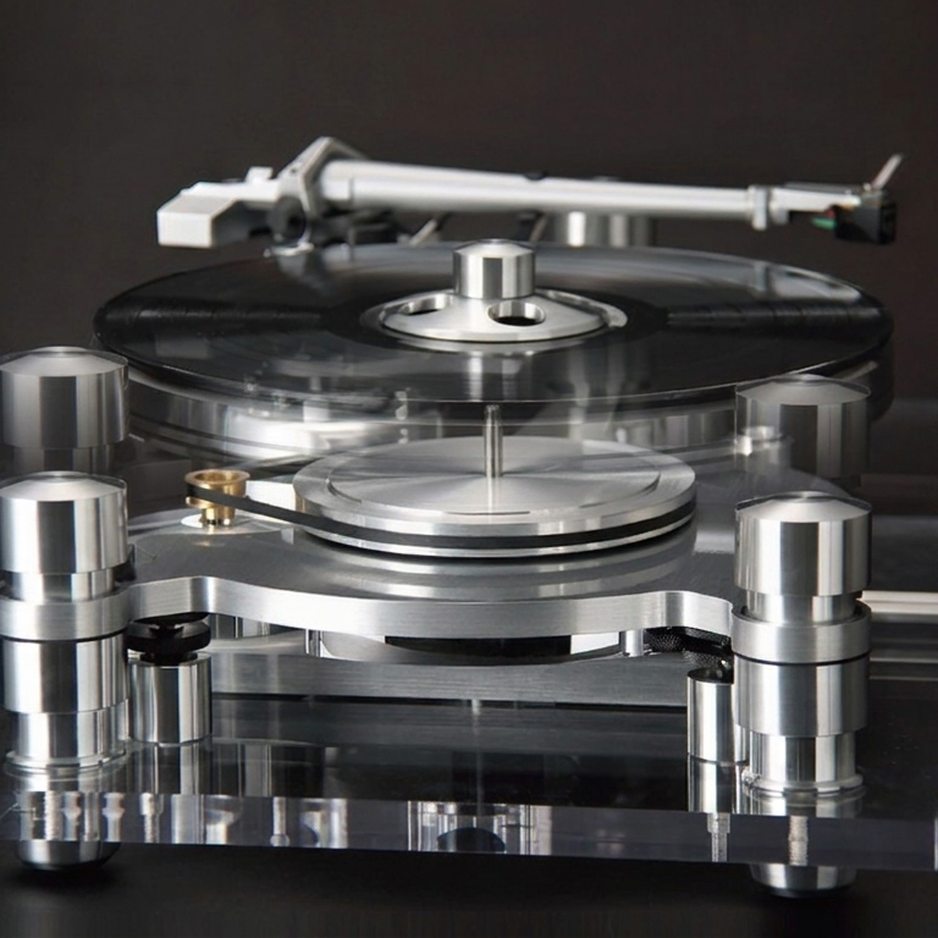 Oracle Audio Delphi MkVI turntable with new two-piece platter assembly visible above the bearing, dark studio background