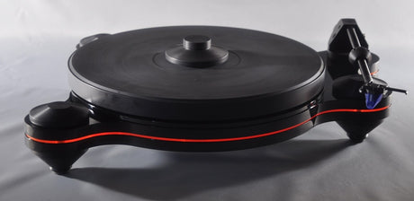 Oracle Audio Origine Acrylic Insert, Neon Orange, shown fitted in a black Origine Mk2 plinth, three-quarter view