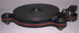 Oracle Audio Origine Acrylic Insert, Matte Red, shown fitted in a black Origine Mk2 plinth, three-quarter view