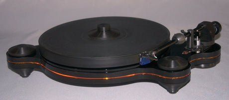 Oracle Audio Origine Acrylic Insert, Transparent Yellow, shown fitted in a black Origine Mk2 plinth, three-quarter view