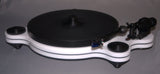 Oracle Audio Origine Acrylic Insert, Matte Black, shown fitted in a white Origine Mk2 plinth, three-quarter view