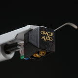 Oracle Audio Thalia Phono Cartridge, ebony, three-quarter view facing right on a tonearm against a black background
