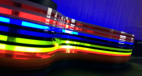 Oracle Audio Origine Mk2 complete color range showing all 12 acrylic insert options stacked