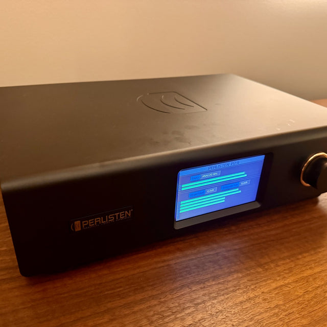 Perlisten DSPx Active Digital Crossover, Black, three-quarter front view from the right with touchscreen lit