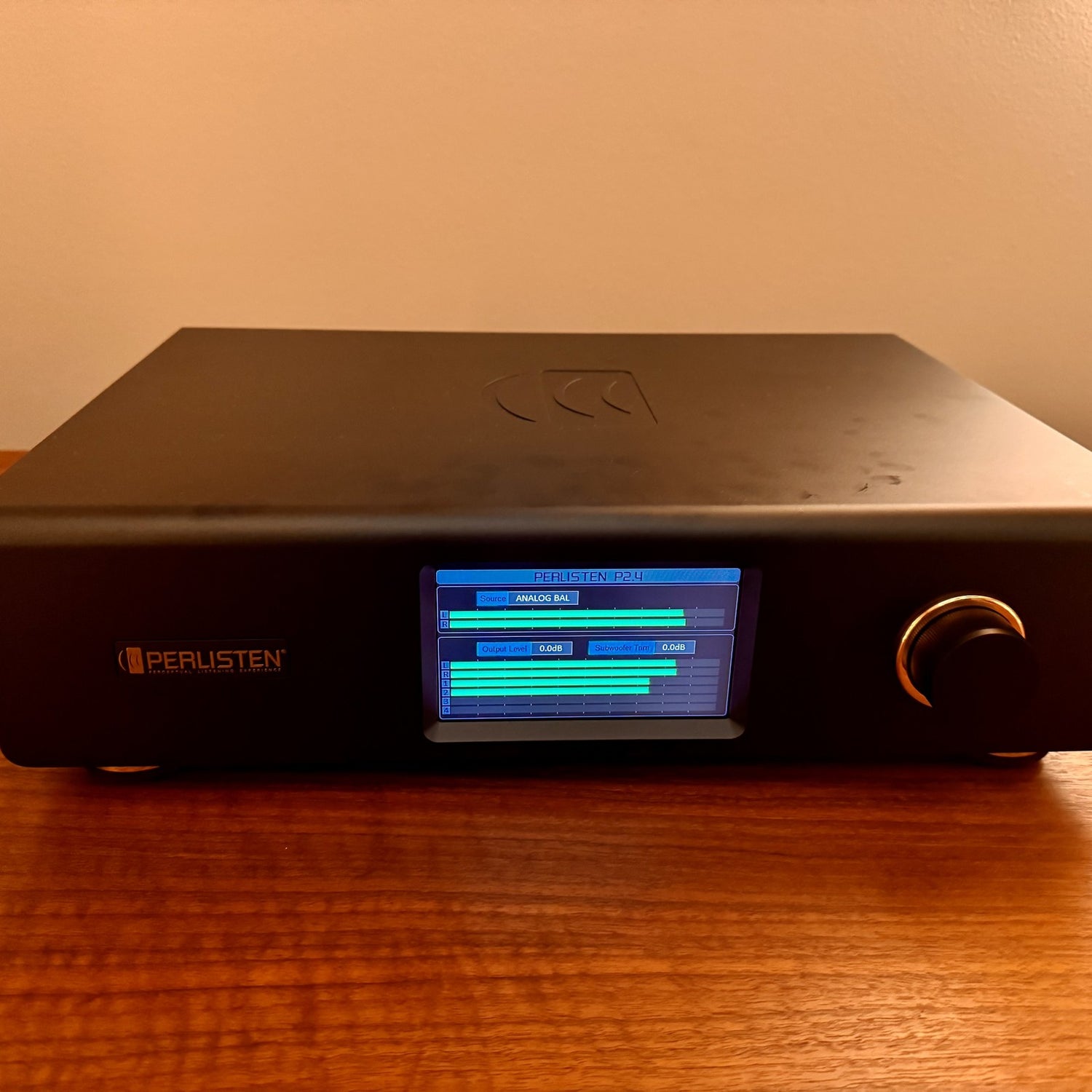 Perlisten DSPx Active Digital Crossover, Black, straight-on front view showing touchscreen and control knob