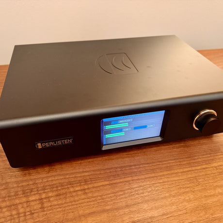 Perlisten DSPx Active Digital Crossover, Black, three-quarter front view from the left showing the embossed top panel