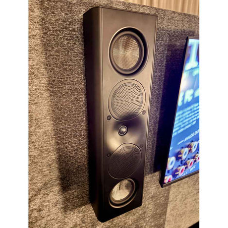 Perlisten X5w on-wall speaker installed, showing three-driver array
