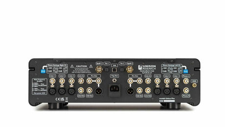 Unico Pre V2 rear panel with phono DIP switches, RCA and XLR inputs, digital connections, dual subwoofer outputs, and 12V trigger