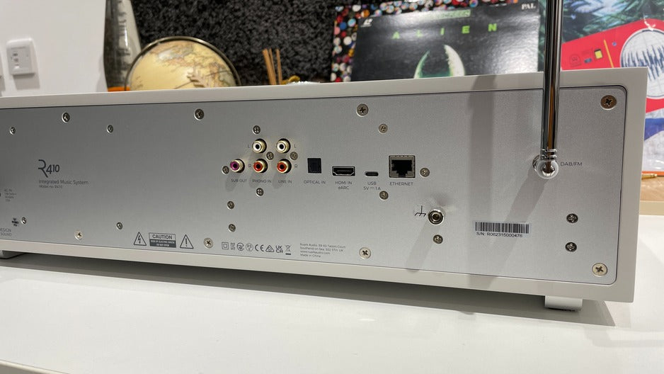 Ruark Audio R410 All-In-One Music System rear panel in real-world setting with vinyl records