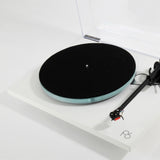 Rega Planar 6 Dual Layer Glass Platter, Clear, fitted to a matt white Planar 6 with felt mat, three-quarter view