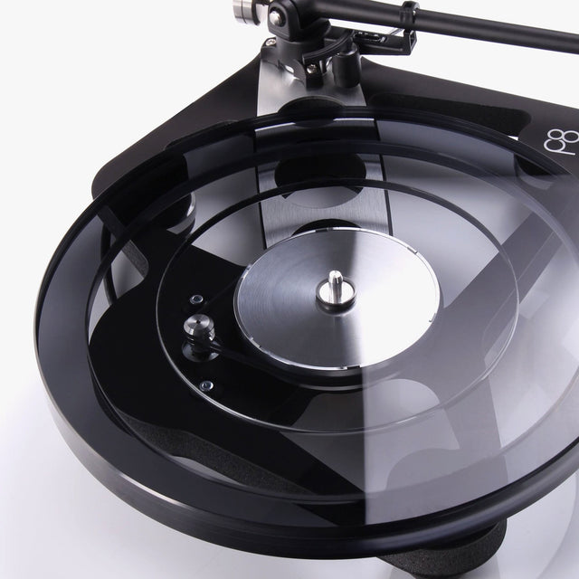 Rega Planar 8 Triple Layer Glass Platter, Smoked, fitted to a Matt Polaris Grey Planar 8, three-quarter view