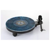 Rega Replay Turntable, black, playing a blue vinyl record, front three-quarter view