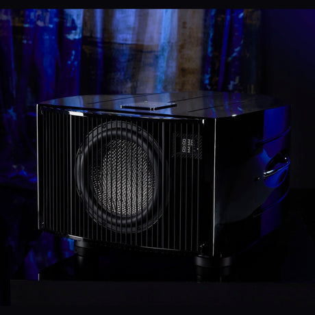 REL Reference No. 35 Subwoofer, Piano Black, three-quarter view with string grille fitted