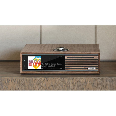 Ruark Audio R710 CD Hi-Fi Console, Fused Walnut, front view on a sideboard