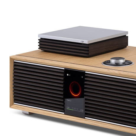 Ruark Audio R-CD100 CD Player, Ebonised (Anniversary Edition), on top of the R410 Anniversary Edition, lifestyle