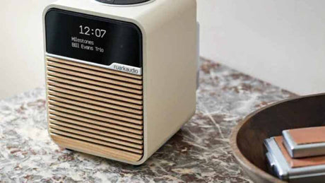 Ruark R1 MK4 in Light Cream finish on a marble side table